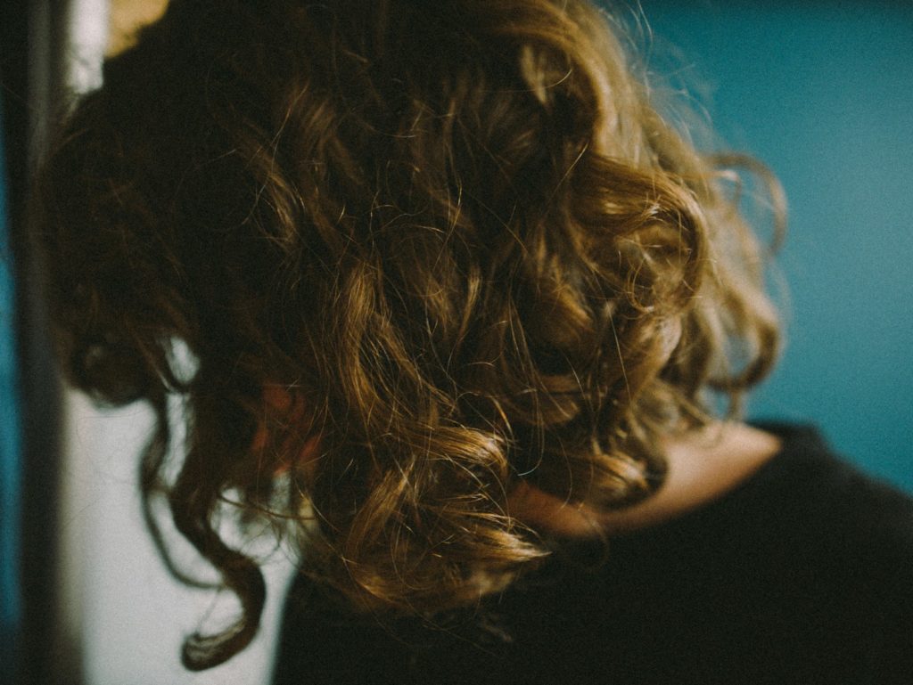 woman in black tank top