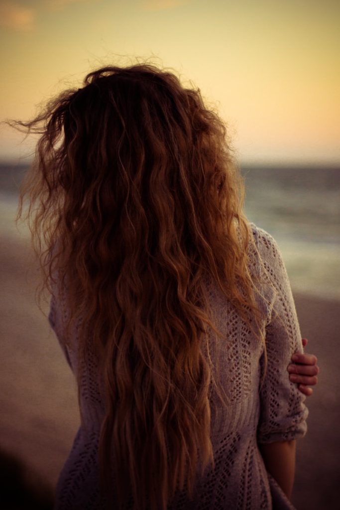 woman in white long-sleeved top snear short